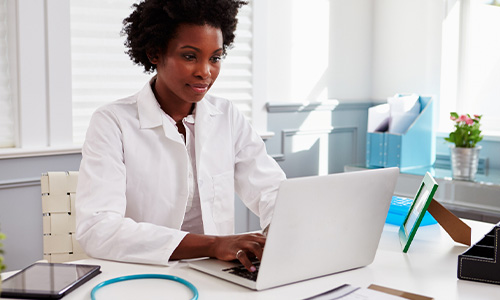 Practice manager comparing the cost of in-house medical billing staff versus outsourcing